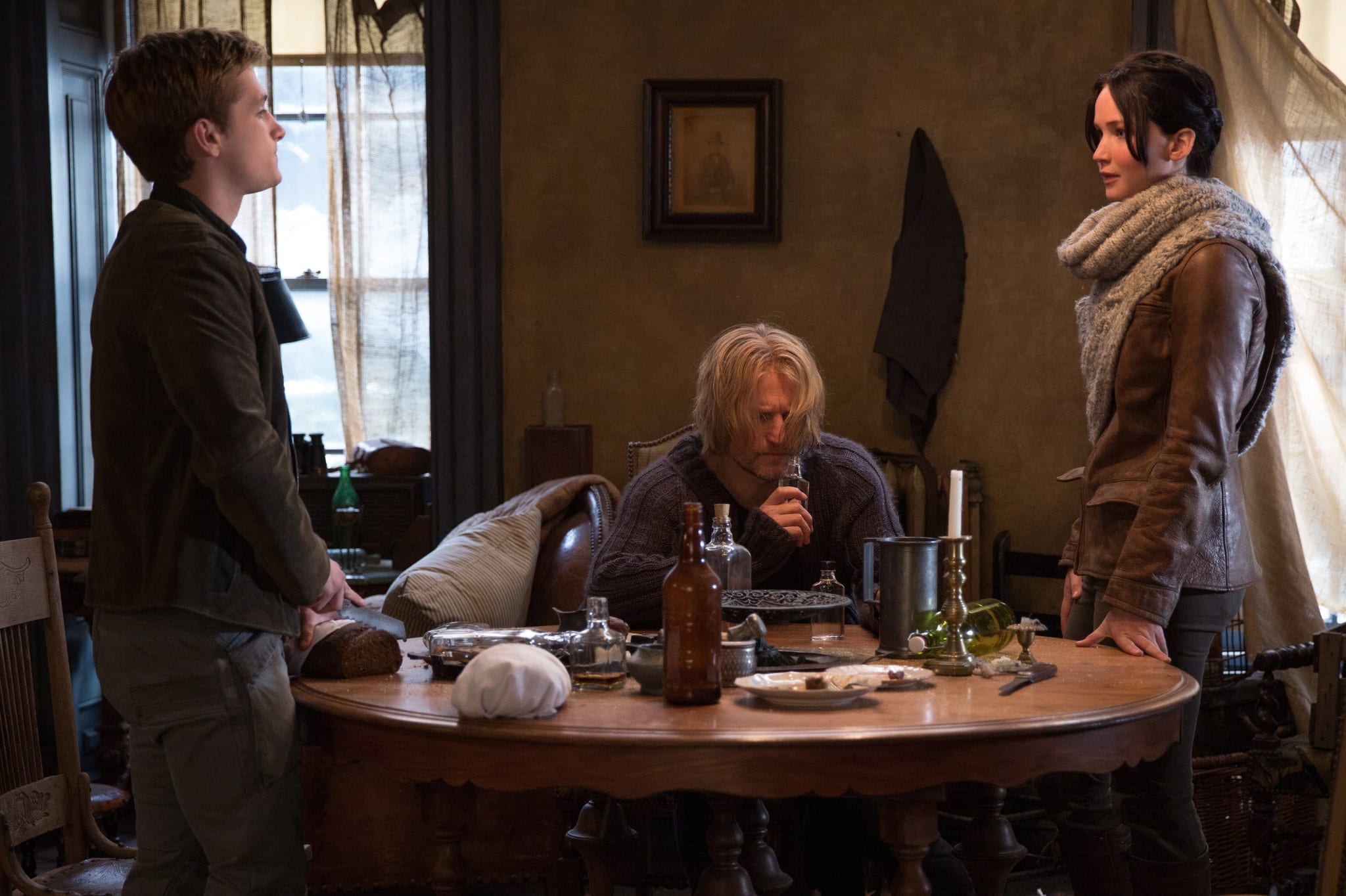 Josh Hutcherson, Woody Harrelson, and Jennifer Lawrence in The Hunger Games: Catching Fire